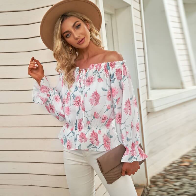 Blomsterbluse med rysjede ermer