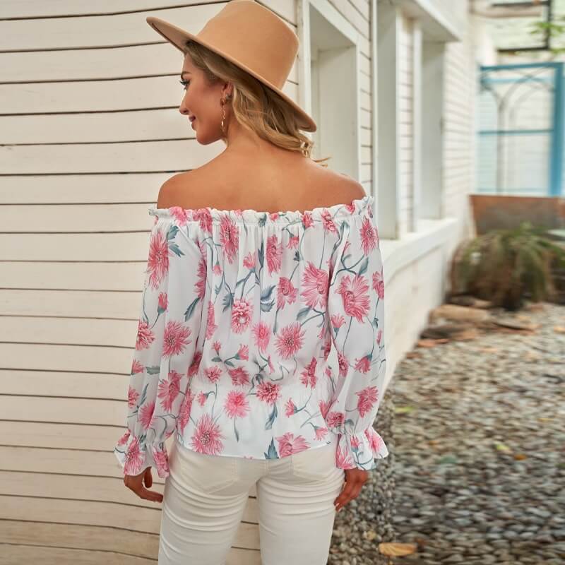Blomsterbluse med rysjede ermer