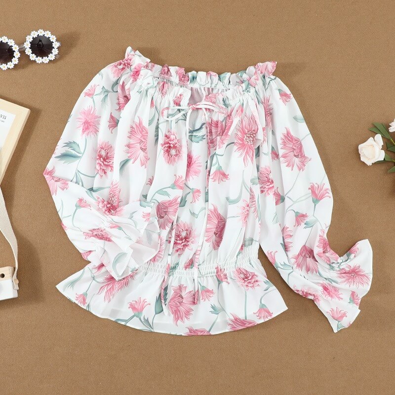 Blomsterbluse med rysjede ermer