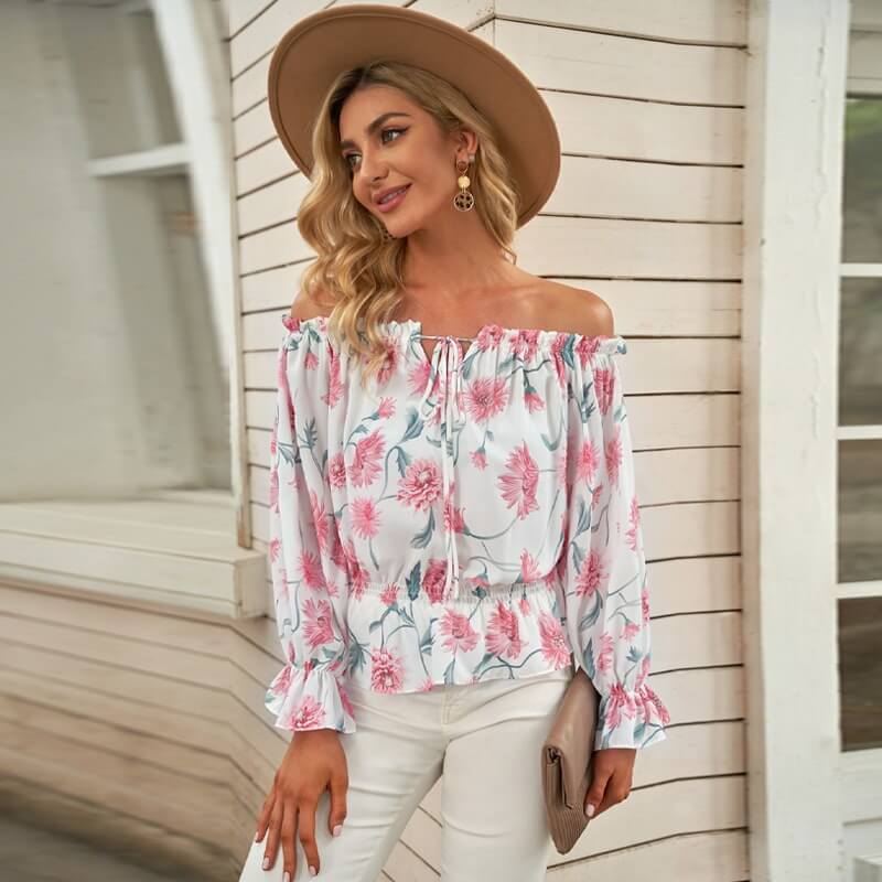 Blomsterbluse med rysjede ermer