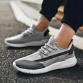 Sneakers i vevd mesh for menn