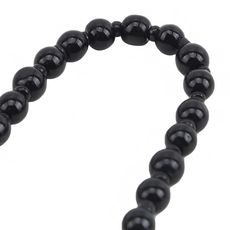 Halskjede med obsidian yin og yang