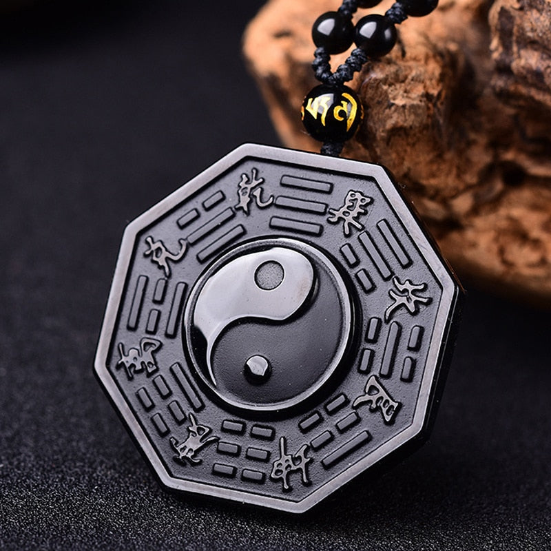 Halskjede med obsidian yin og yang
