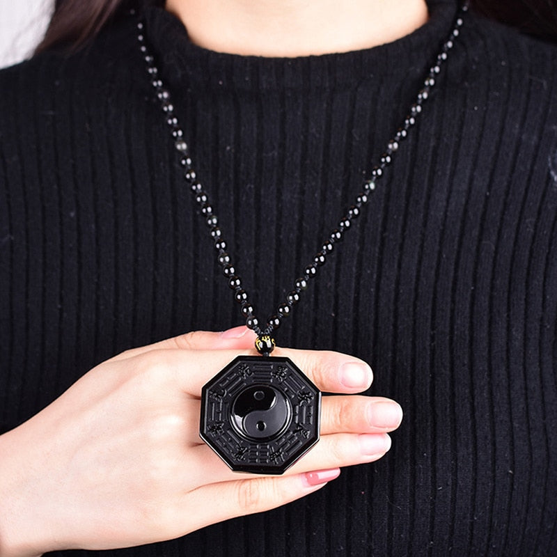 Halskjede med obsidian yin og yang