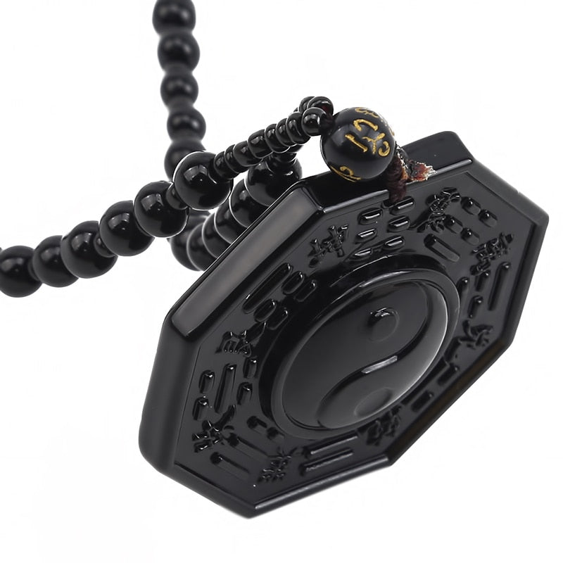 Halskjede med obsidian yin og yang