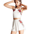 Sett med brodert magetopp og shorts med blomster