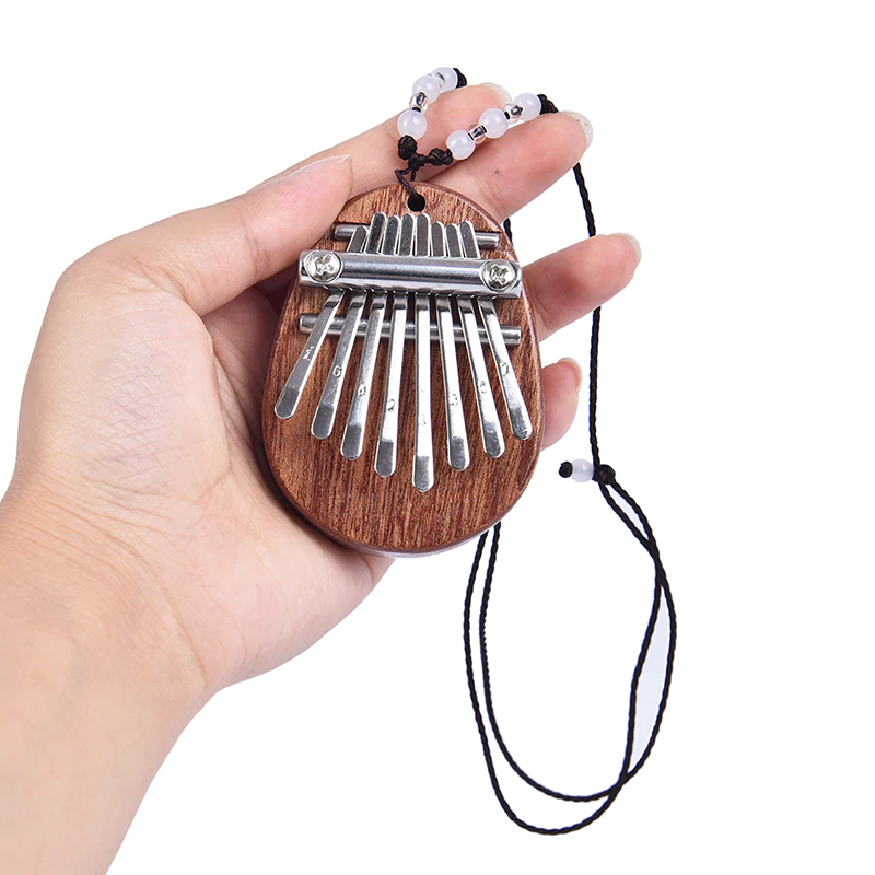 Mini Kalimba 8 tangenter tommelklaver