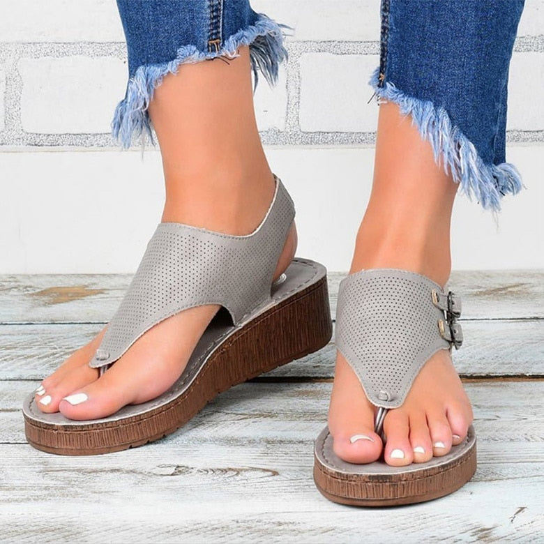 Ortopediske sandaler med spennestropp
