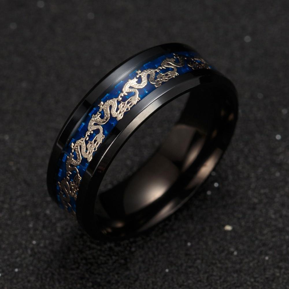 Ringer i titanlegering med drage-motiv