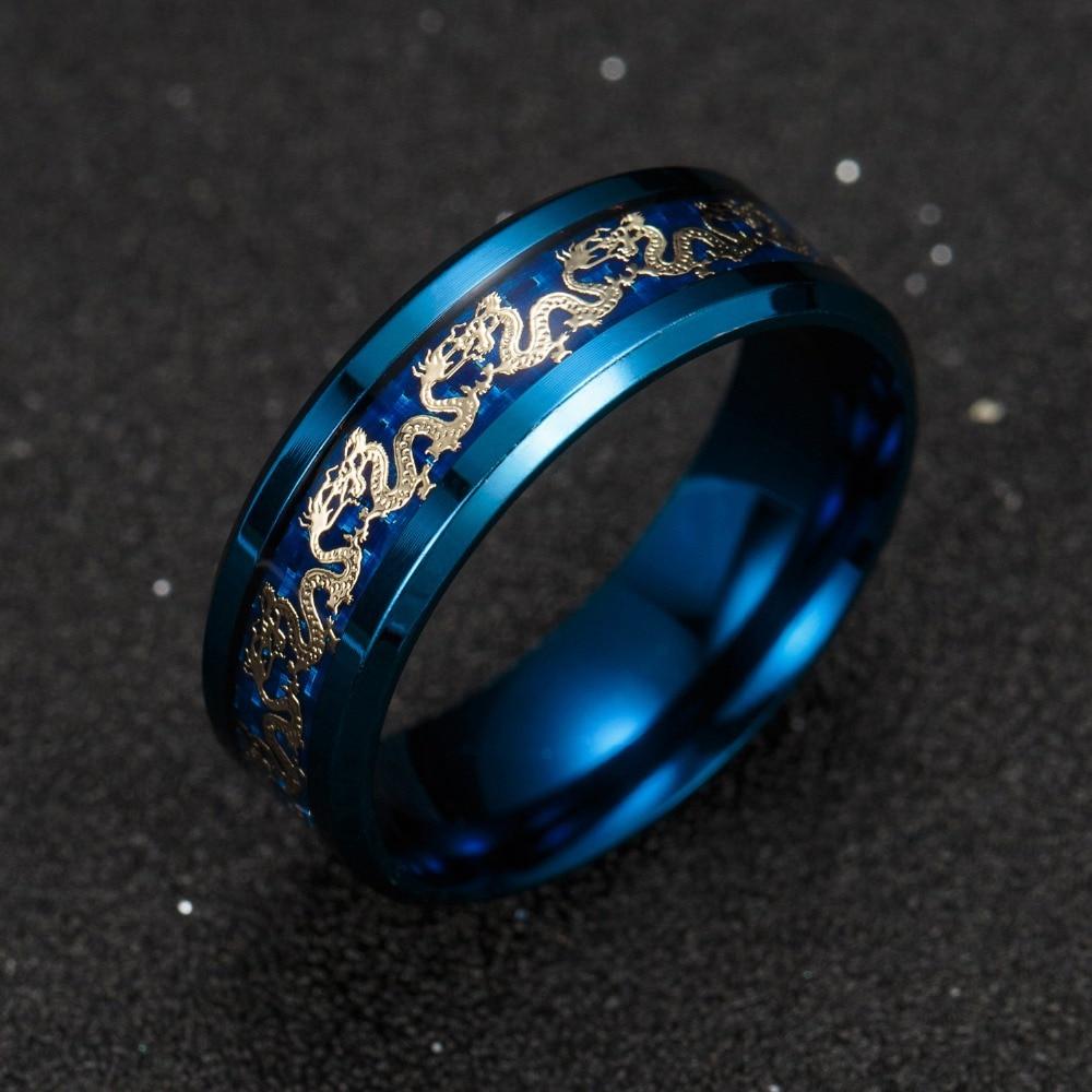 Ringer i titanlegering med drage-motiv