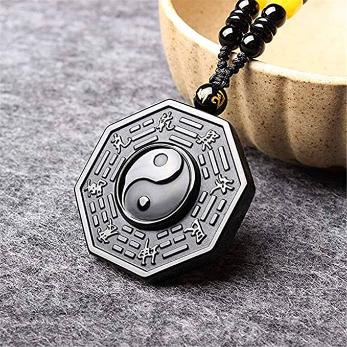 Halskjede med obsidian yin og yang