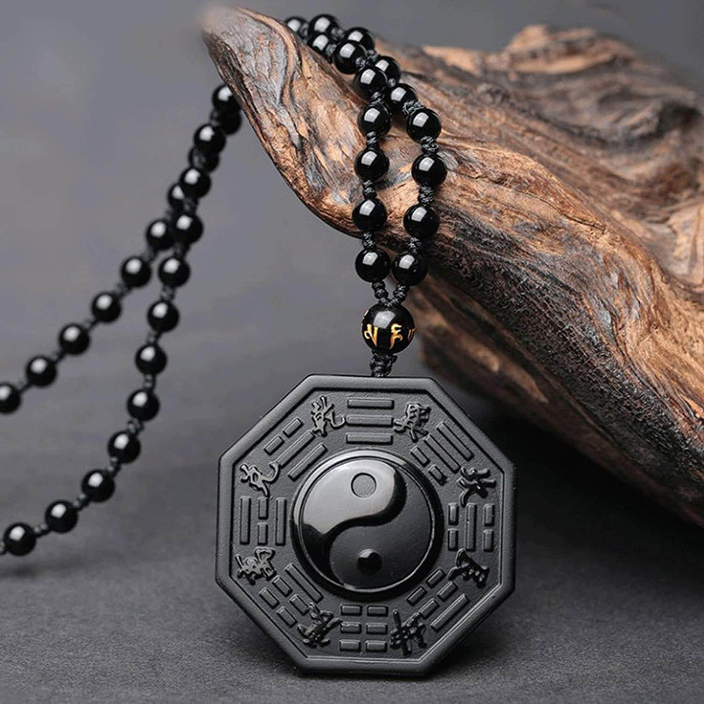 Halskjede med obsidian yin og yang
