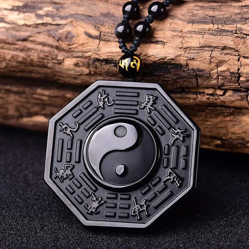Halskjede med obsidian yin og yang